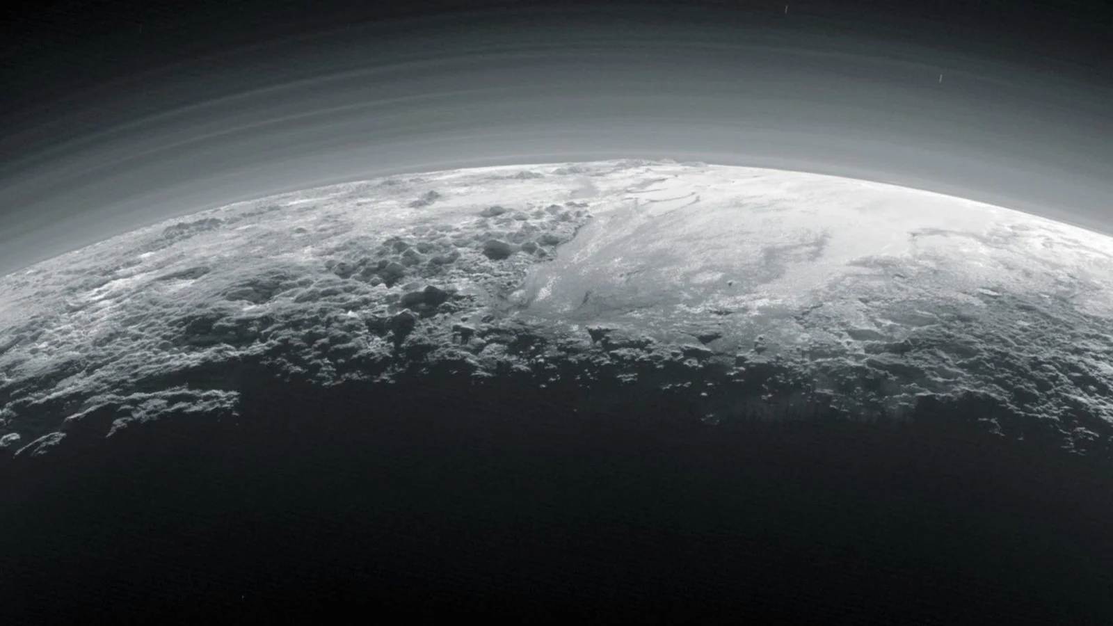 Pluto's Atmosphere Freezes as It Moves Away from the Sun