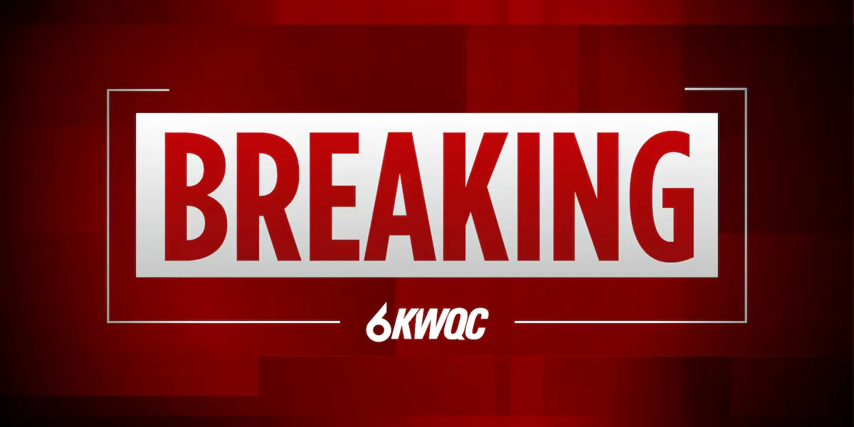 Armed suspect on the run after Muscatine officer shot