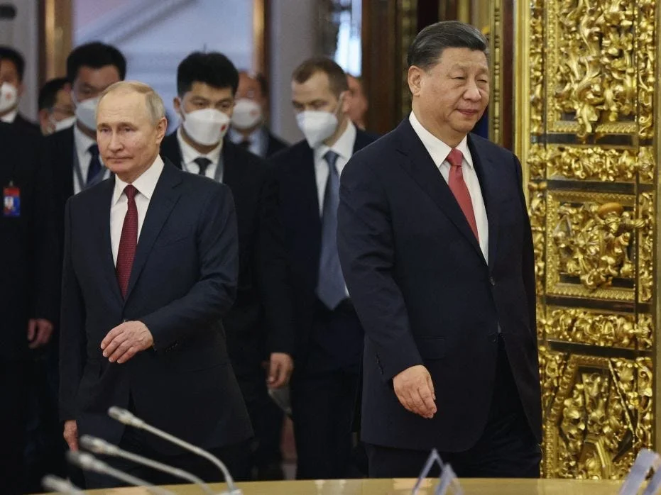 Putin denies military alliance with China, accuses West of building WWI-like axis.
