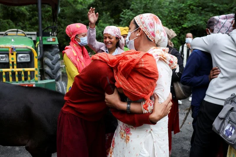 Four days of searching in Nepal floods end with heartbreak as son identified and cremated